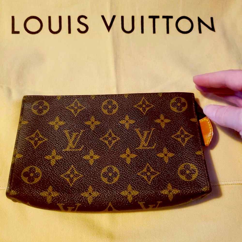 Louis Vuitton LV monogram toiletry bag with divider.